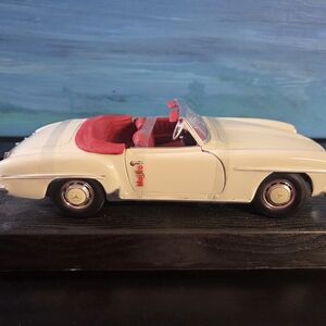 Classic White and Red Toy Car